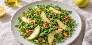 Ensalada de rúcula, pera y nueces con vinagreta de limón